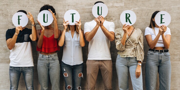 Group of young people hiding their face with the world Future.