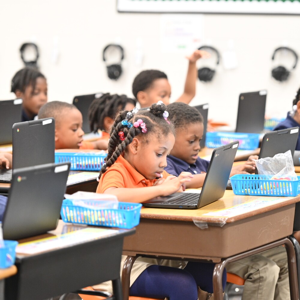 Building Equity Initiative. BEI. Resurgence Hall students laptops