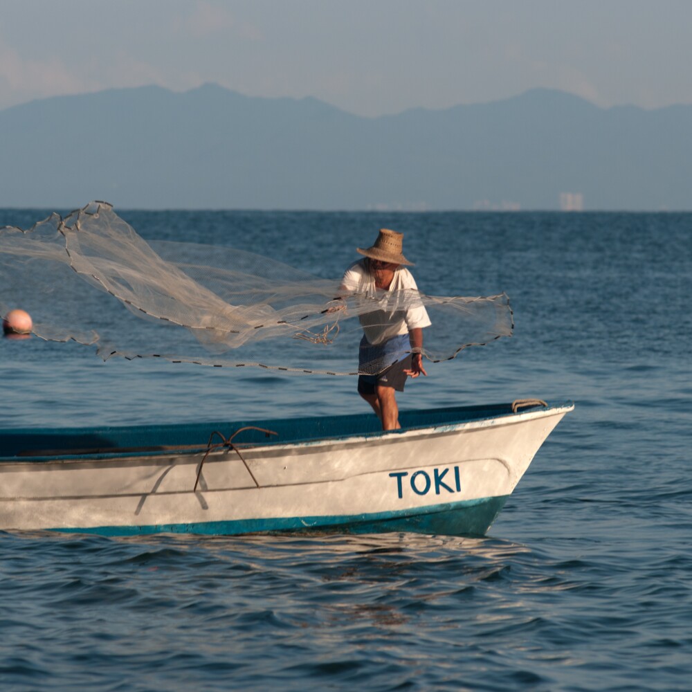 Fisherman Casting Net