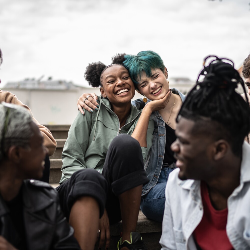 Friends talking in the street