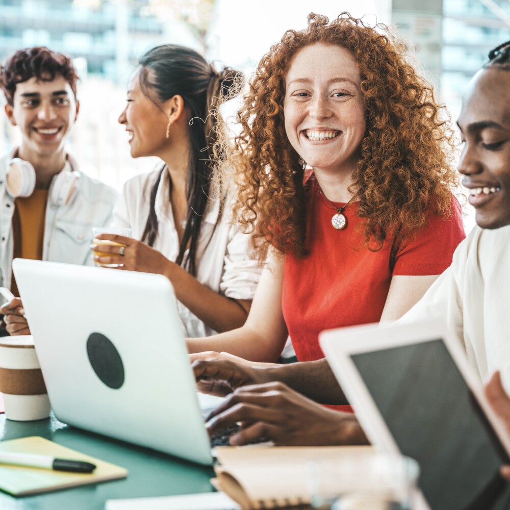 Gen Z students work at computers.