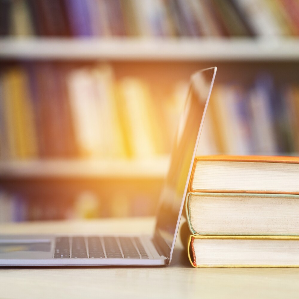 Desktop computer and textbooks