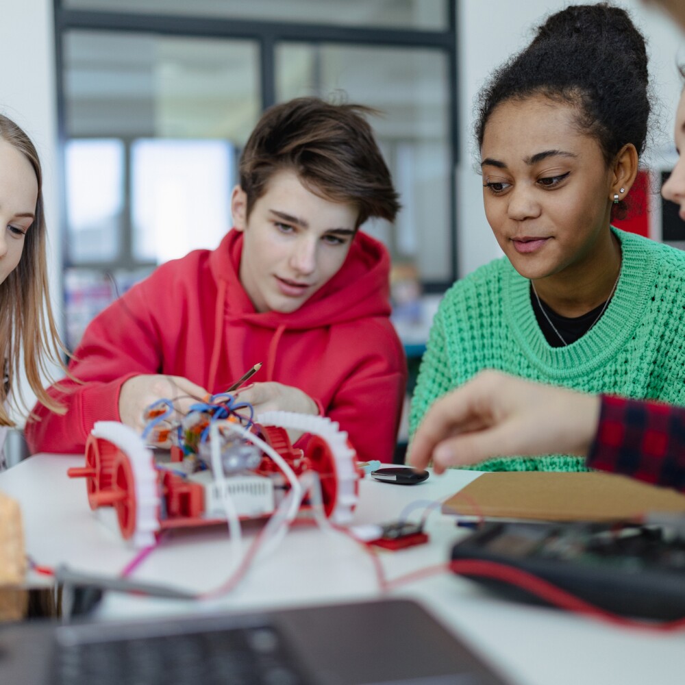 Gen Z students work on robotics