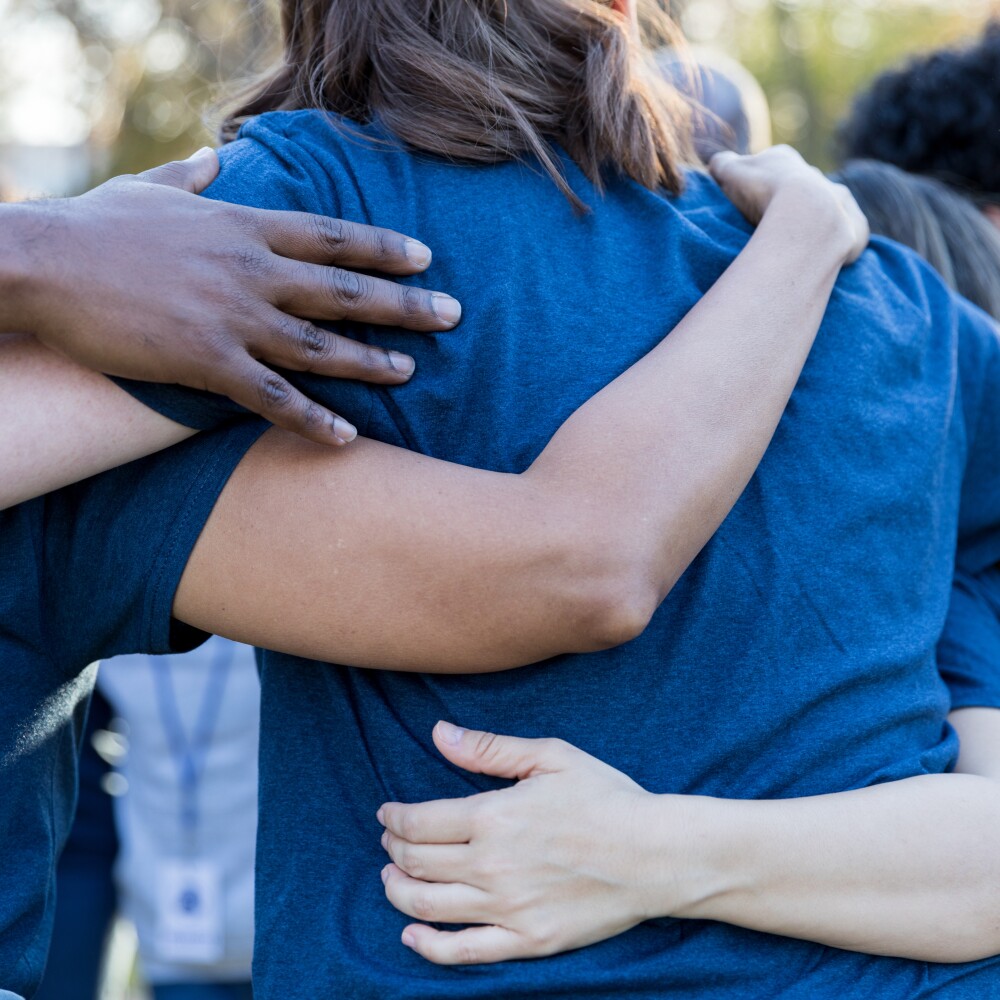 Friends Arms Around Each Other