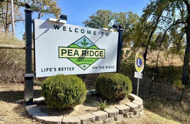A large sign shows a new logo for the city of Pea Ridge, Arkansas
