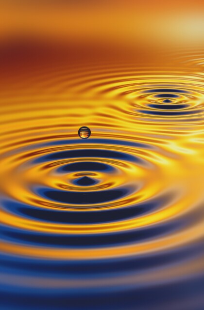 Water rippling at sunset