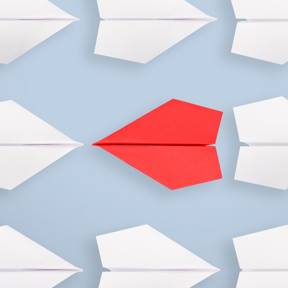Paper airplane arrows red and white