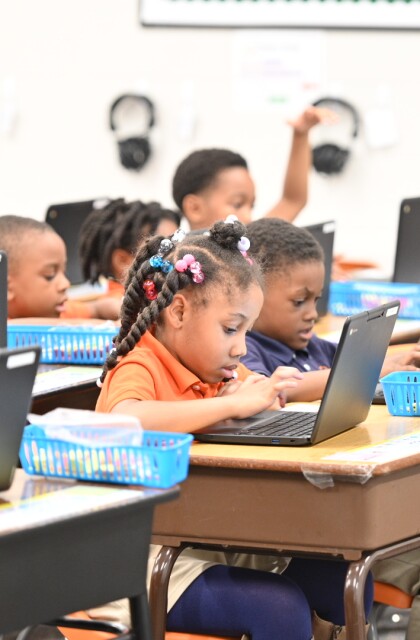 Building Equity Initiative. BEI. Resurgence Hall students laptops