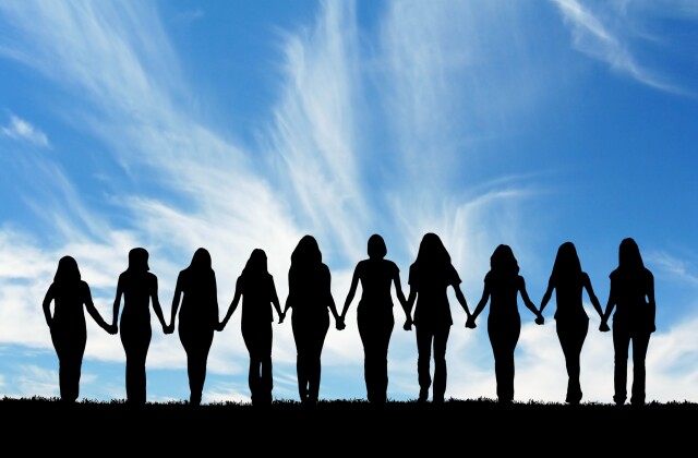 Women holding hands stock photo