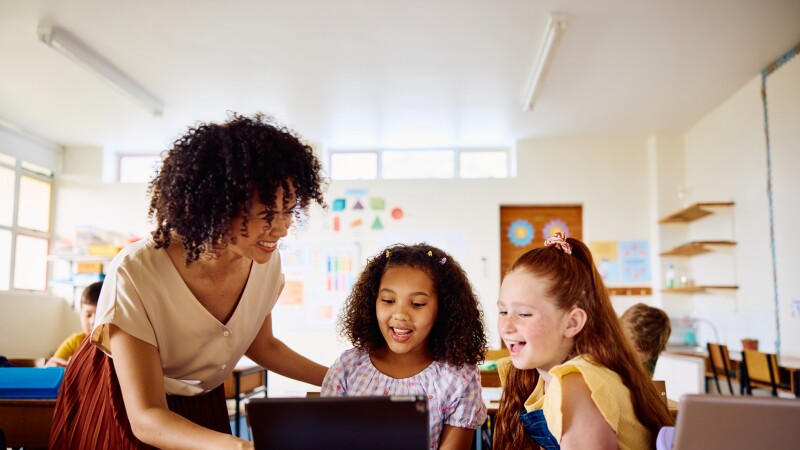 Teacher pointing to students