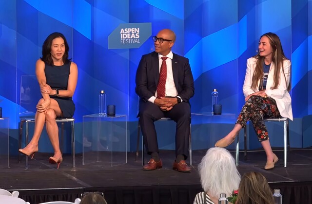 Two women and a man sit onstage at a panel at the Aspen Ideas Festival. 