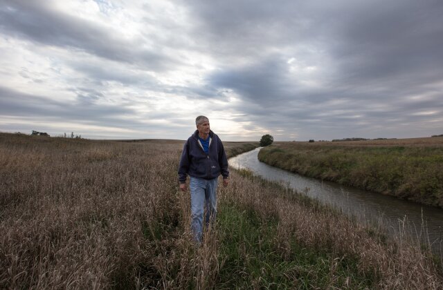 Tim Smith Roots of Conservation field river landscape