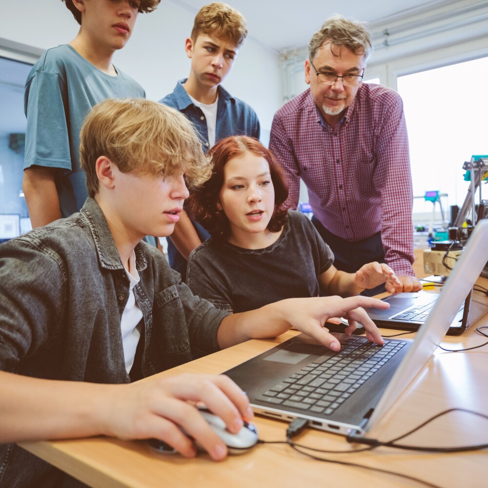 Gen Z youth with teacher.
