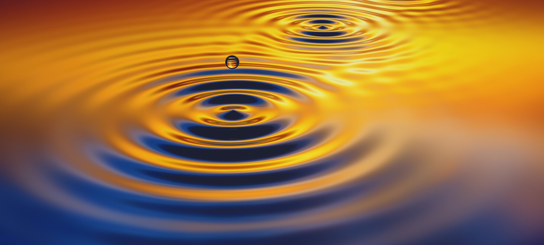 Water rippling at sunset