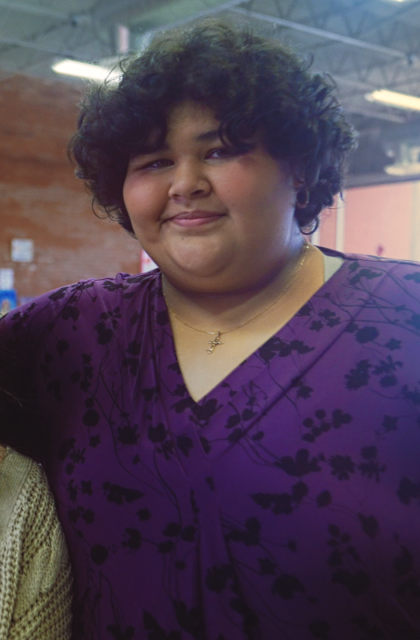 WeThrive students Cisa Salazer  and Chelsea Vasquez smile and embrace at the Hawthorne Teen Center in Hawthorne, California.