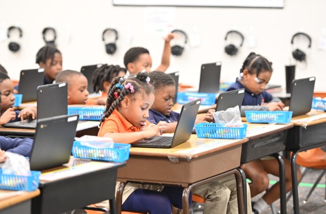 Building Equity Initiative. BEI. Resurgence Hall students laptops