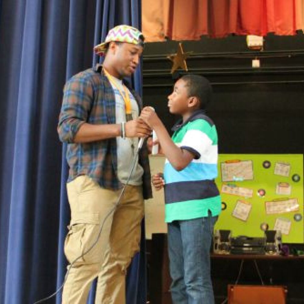 Jason Terrell encourages a student while speaking at Freedom Schools in Charlotte, N.C.